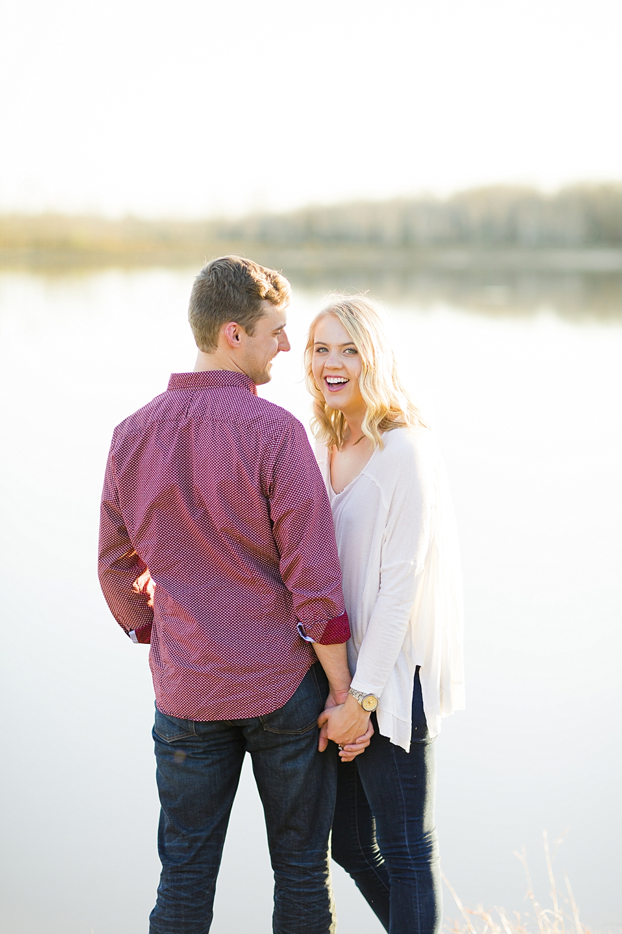 beautiful couple engagement photo by lake