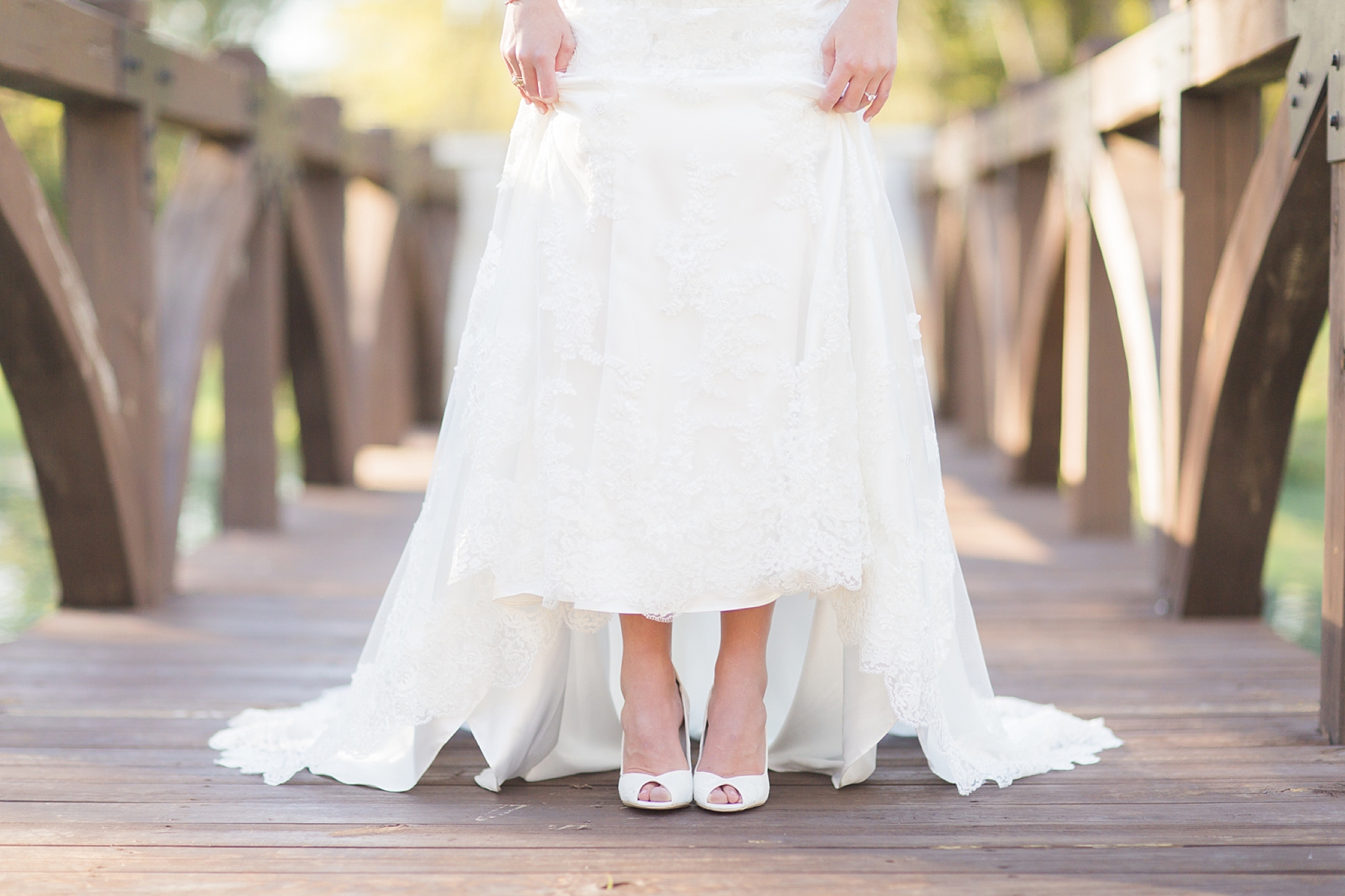 bride's shoes on bridge