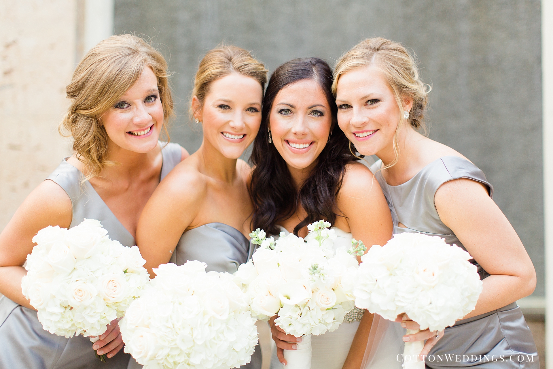 bride posing with sisters