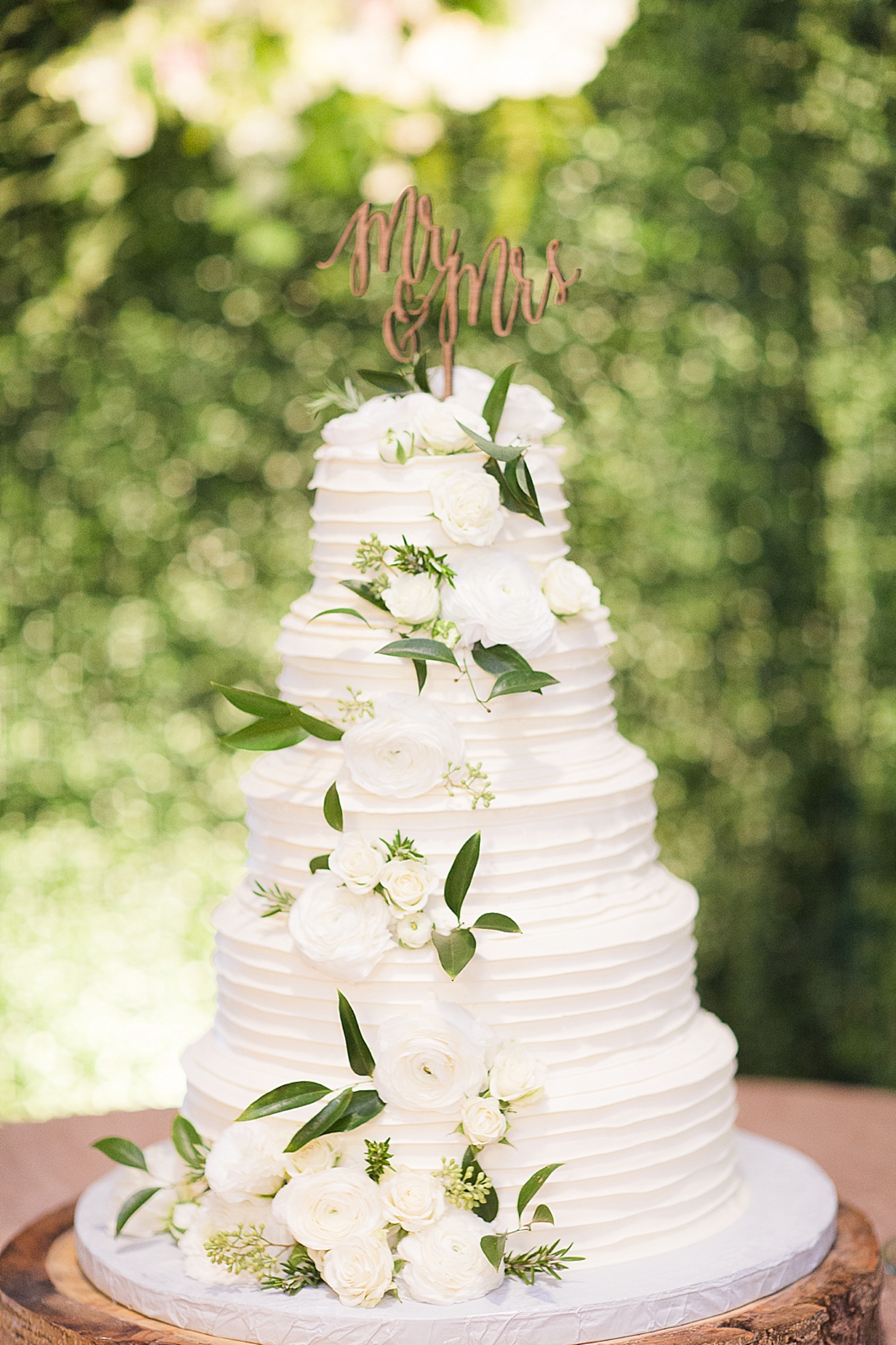 white wedding cake floral wall