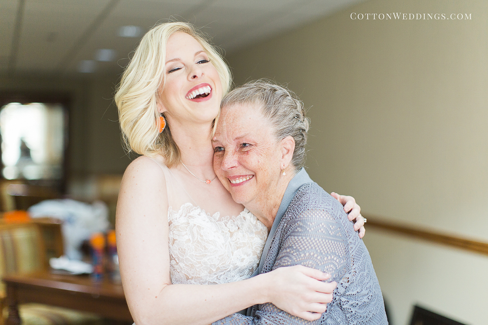 mom hugging bride