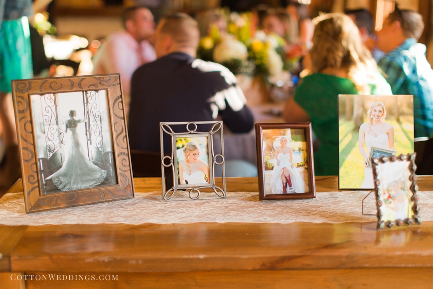 bridal photos displayed at reception