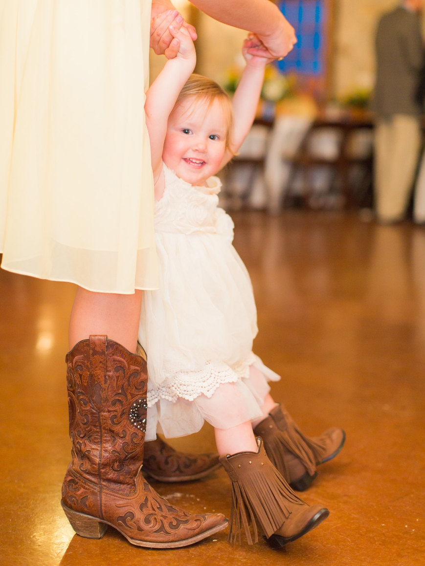 cute flower girl dancing with boots
