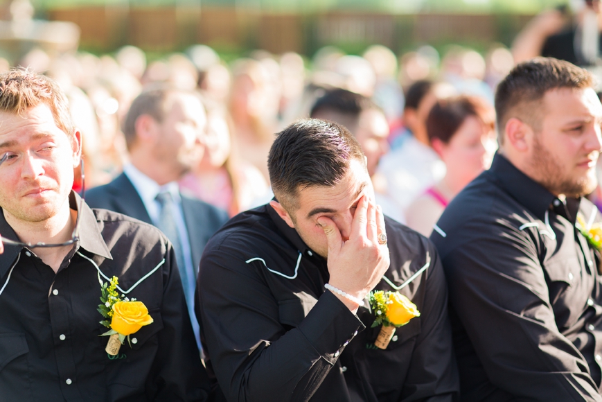 brother crying watching ceremony
