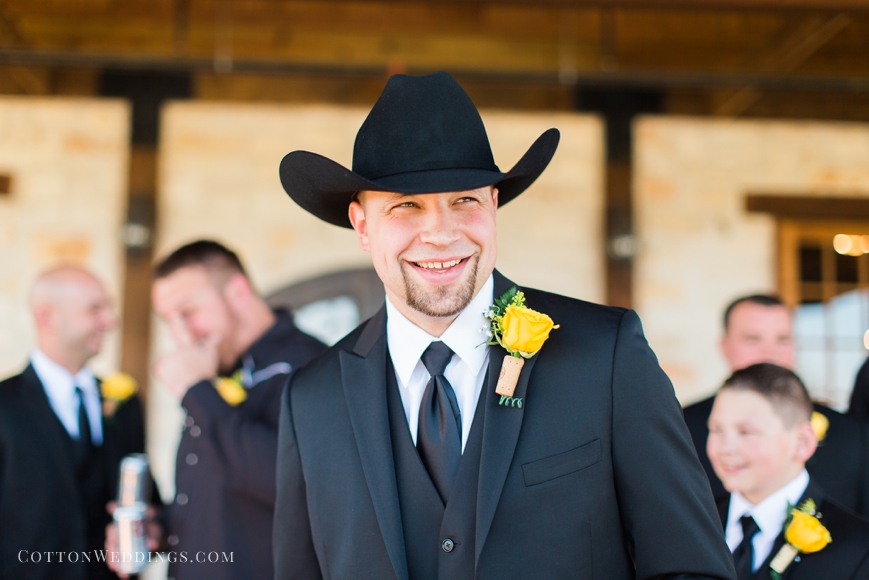 happy groom with cowboy hat