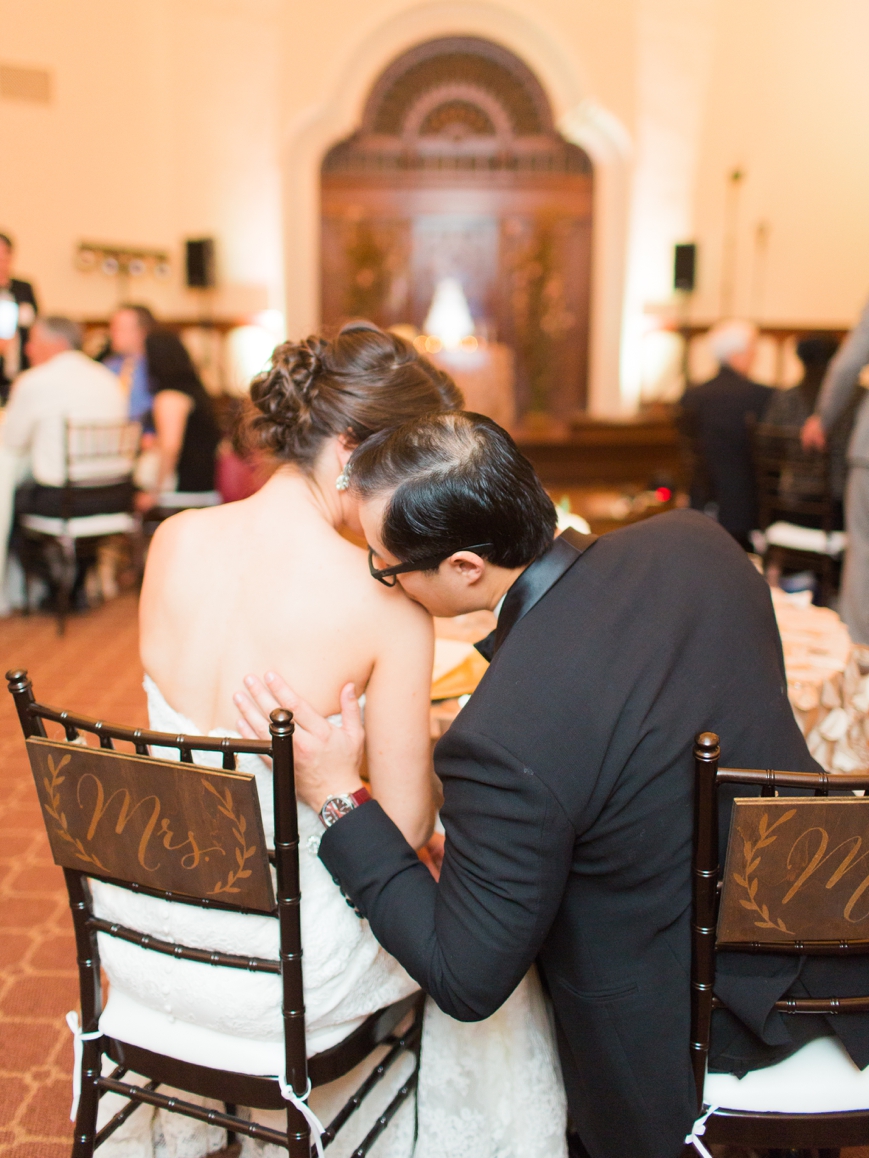 bride groom kissing during reception parador