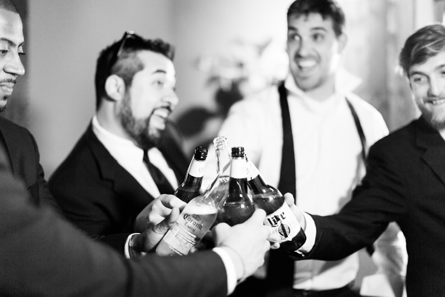 groomsmen toasting to groom