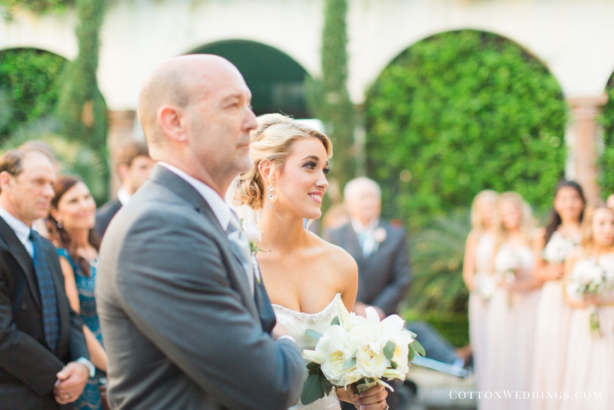 happy bride looking at groom with dad