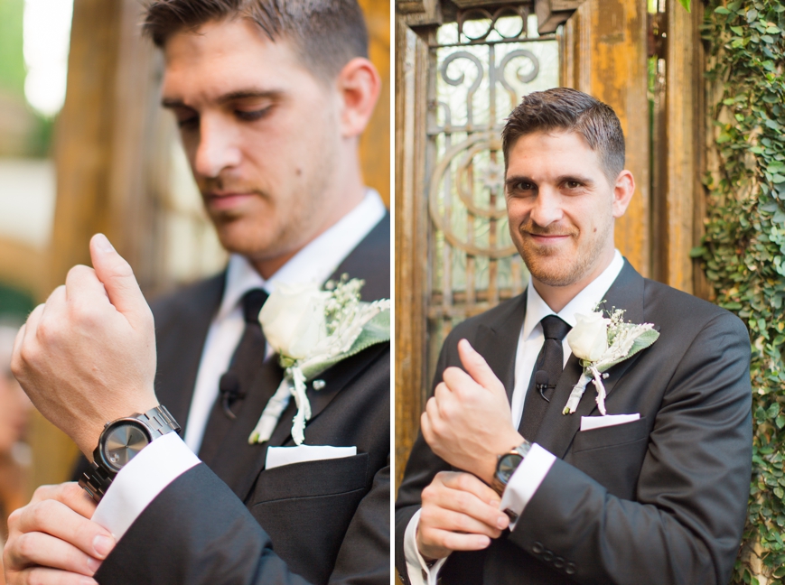 groom putting on watch gift from bride