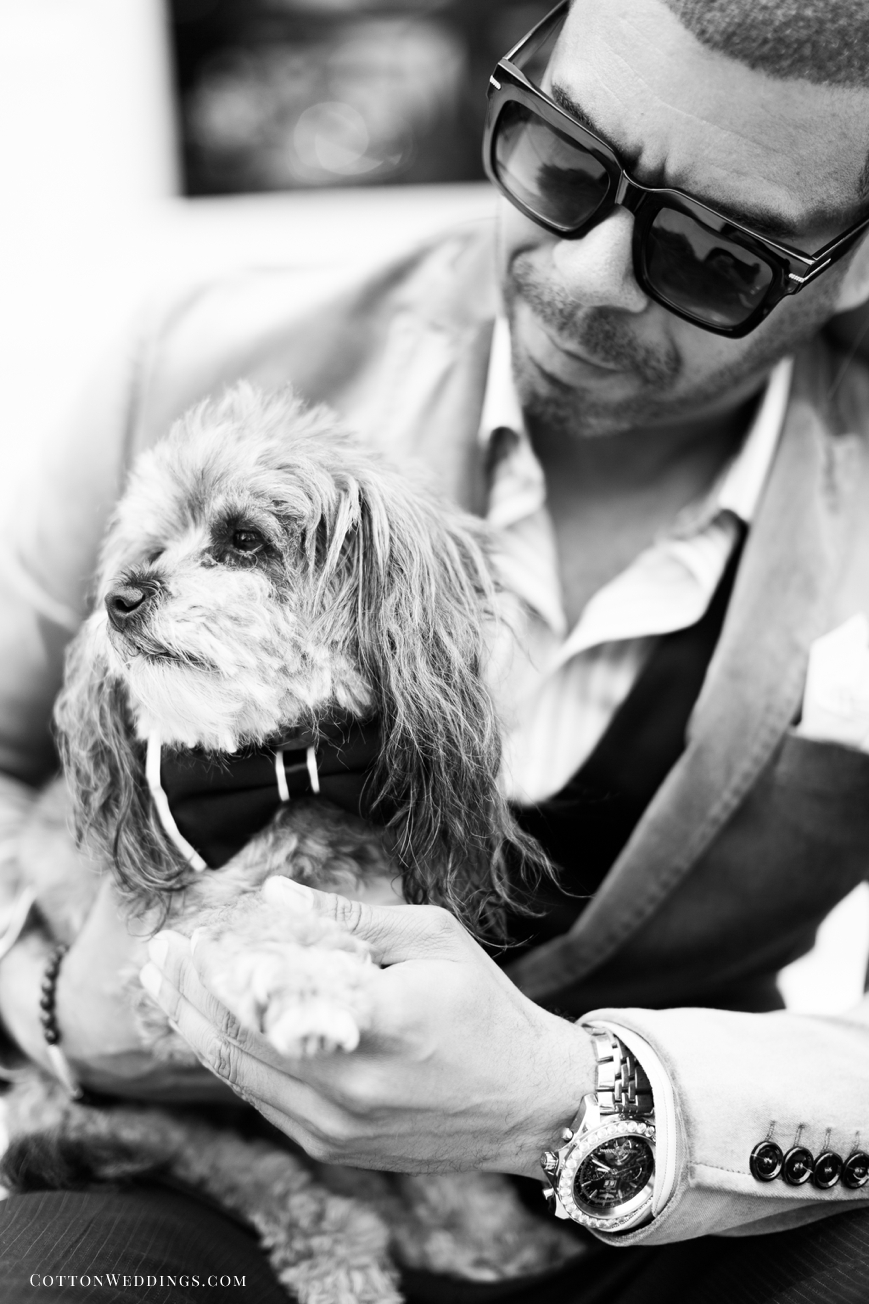 black and white portrait of man with schnoodle dog