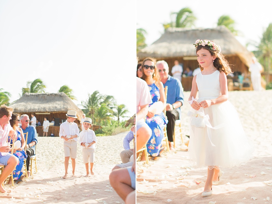 ring bearers and flower girl walking down the aisle at beach wedding
