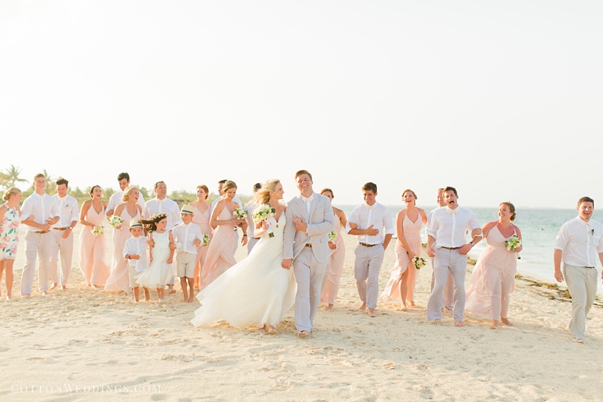 bride and groom with bridal party destination beach wedding