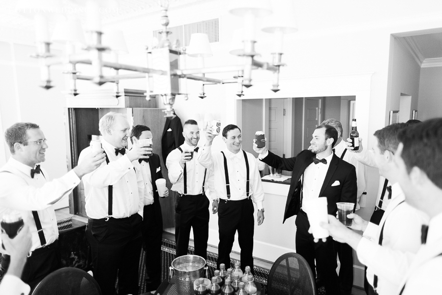 groom toasting with groomsmen