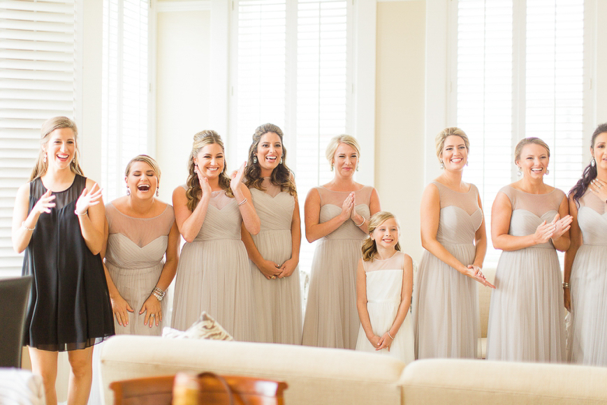 happy bridesmaids excited to see bride