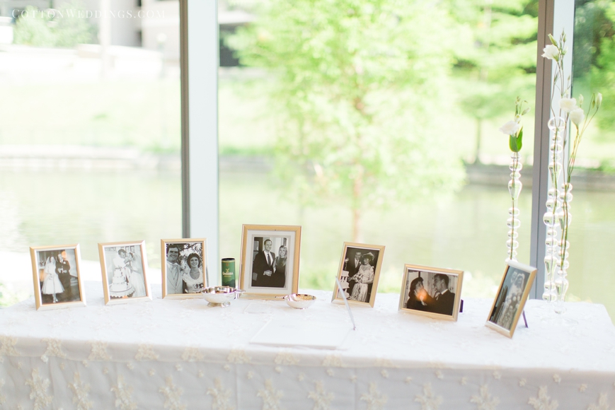 table with photos from families' weddings