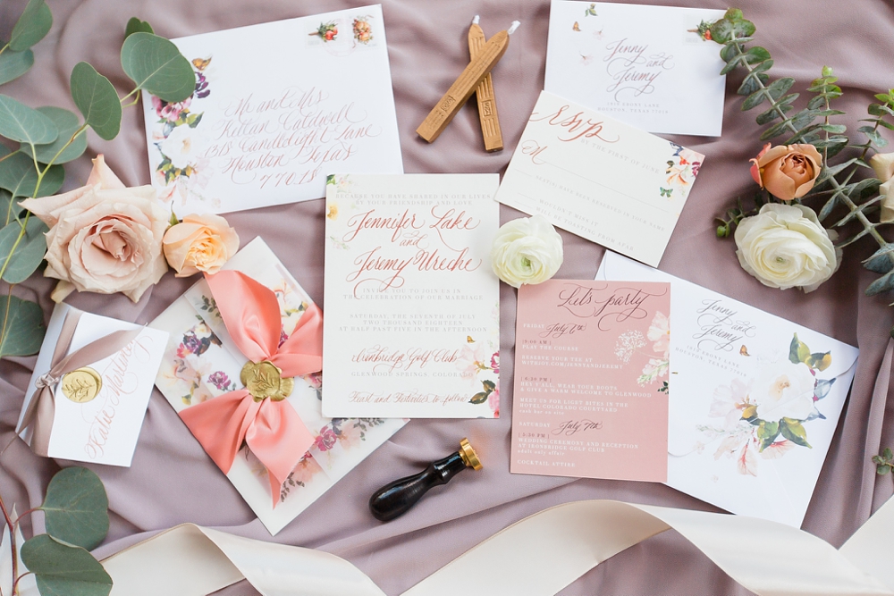 a fine flourish floral calligraphy wedding suite