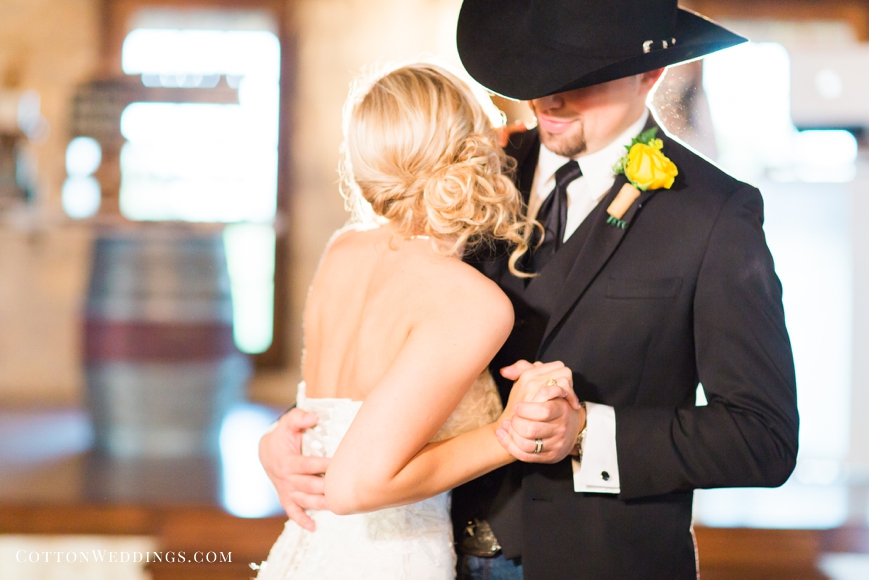 beautifully lit photo of bride and groom's first dance