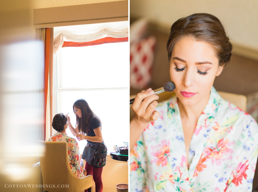 bride in floral robe getting makeup done