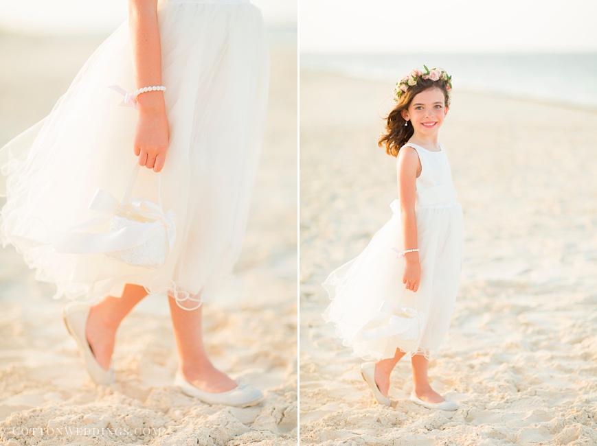 adorable flower girl with flower crown on beach