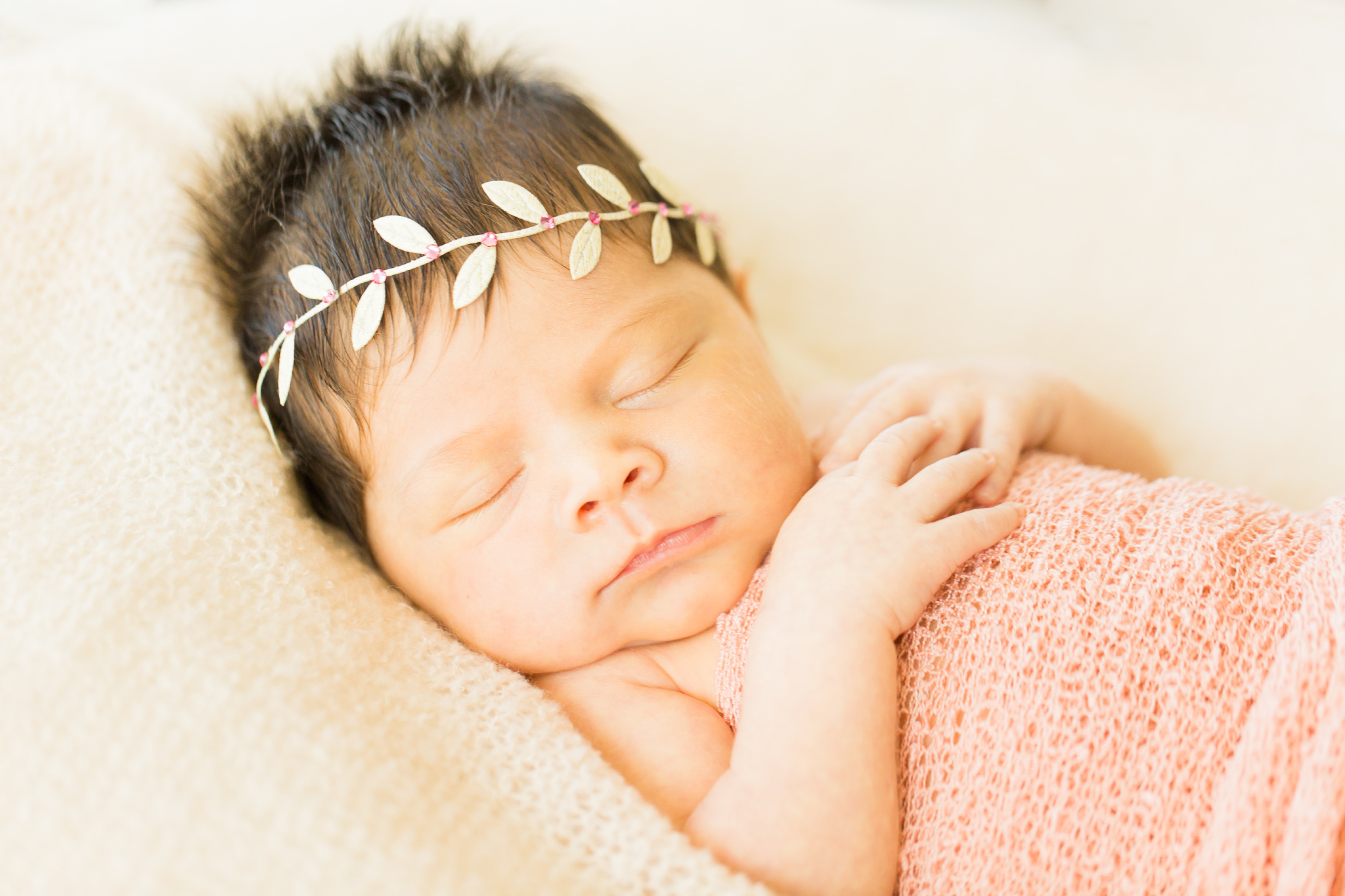 baby with floral headband